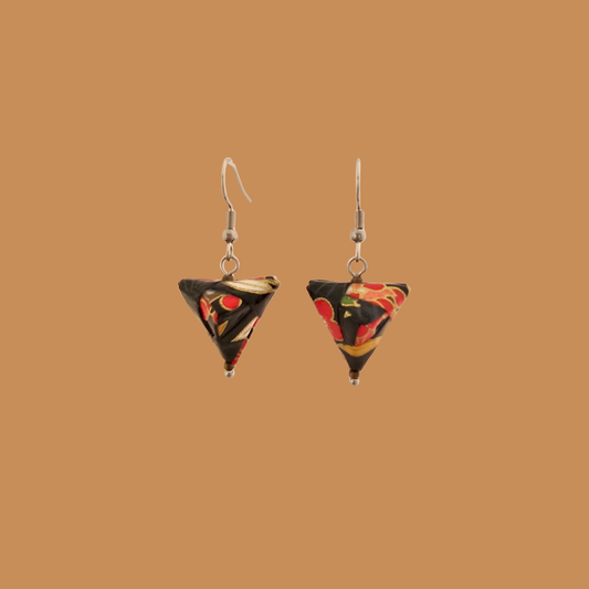 Black and Red triangle geometric origami earrings with a floral and geometric pattern on a beige background