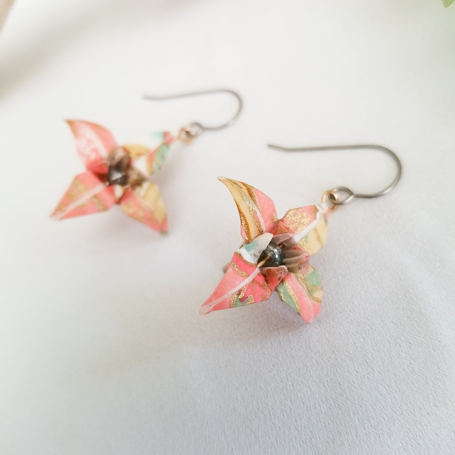 Origami Lily Earrings in peach color. Handmade folded paper flowers made into small earrings. 