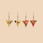 Pair of Read and Yellow geometric origami earrings with a floral pattern on a beige background